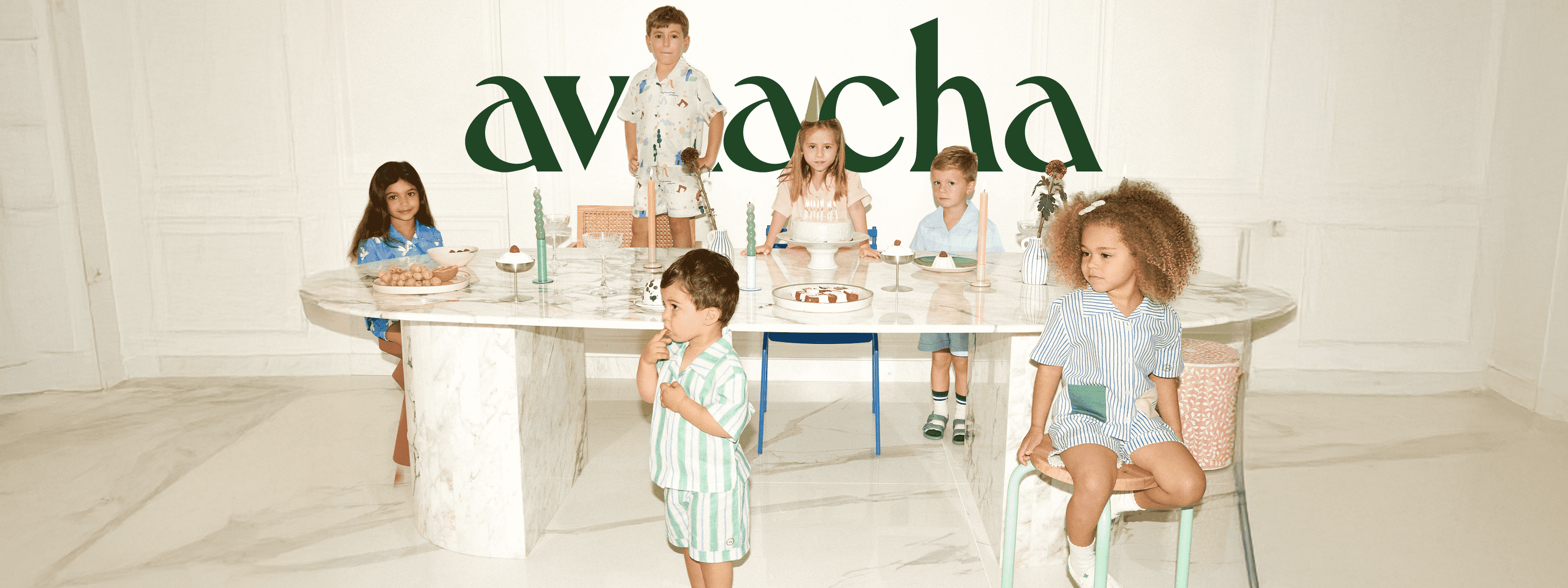 Dubai, UAE, Shopiva Children wearing Avaacha striped and patterned shirt-and-shorts co-ord sets, showcasing fabric texture, fit and seasonal colors.