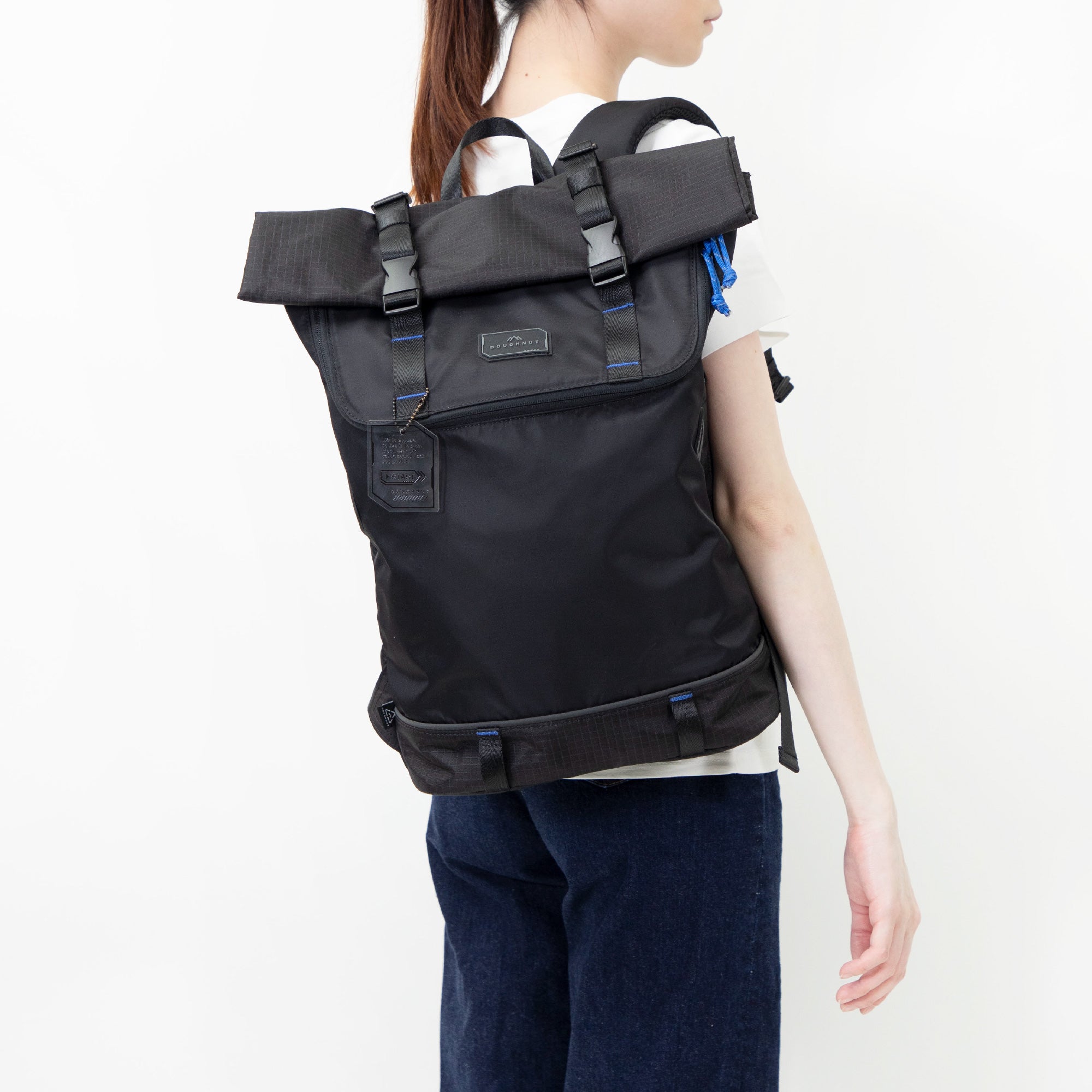 Doughnut Christopher Gamescape backpack in black – recycled roll-top design