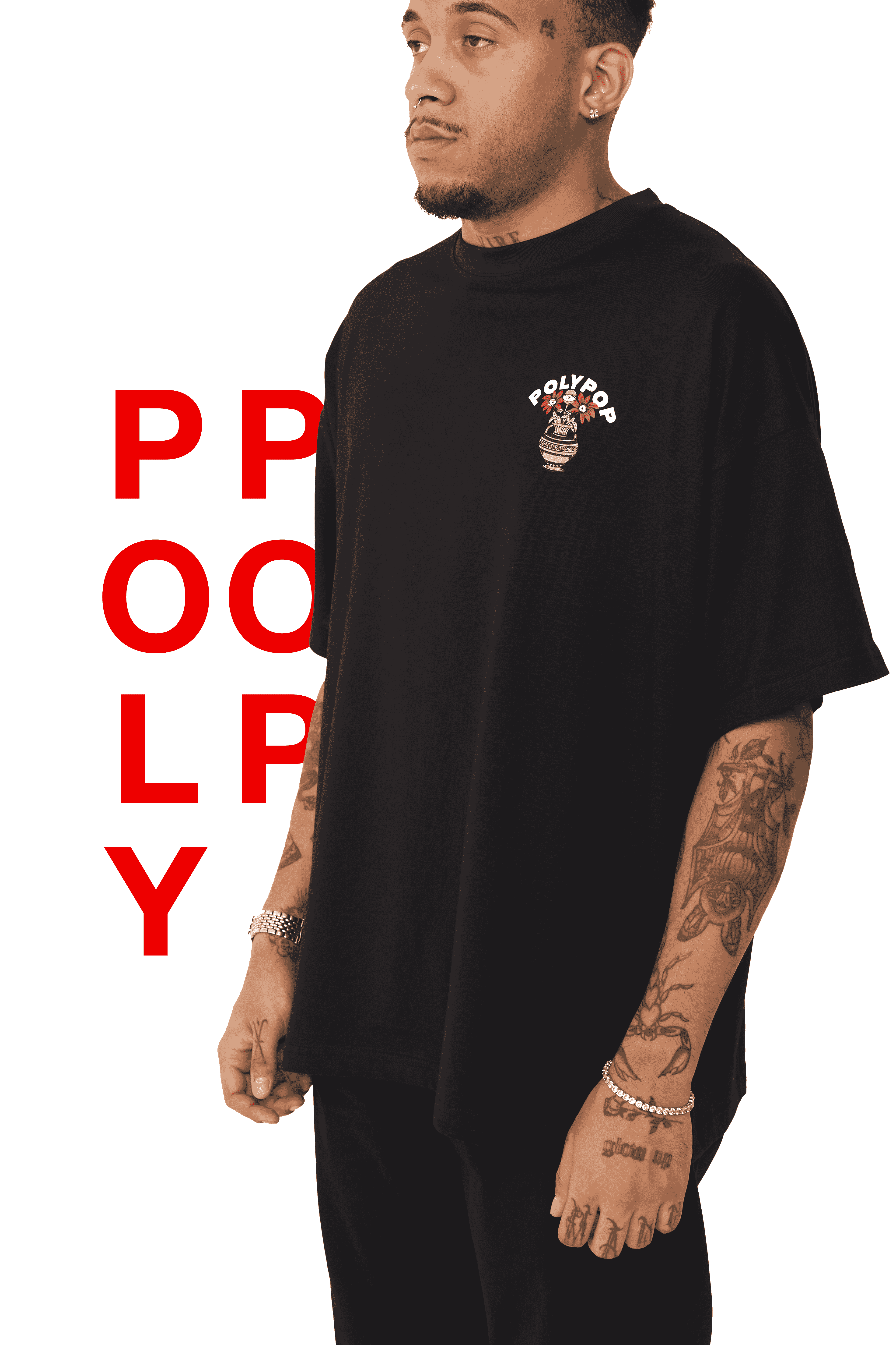 Dubai, UAE, Shopiva Polypop black boxy fit T-shirt with small vase graphic on the chest, photographed on a white background with red Polypop text